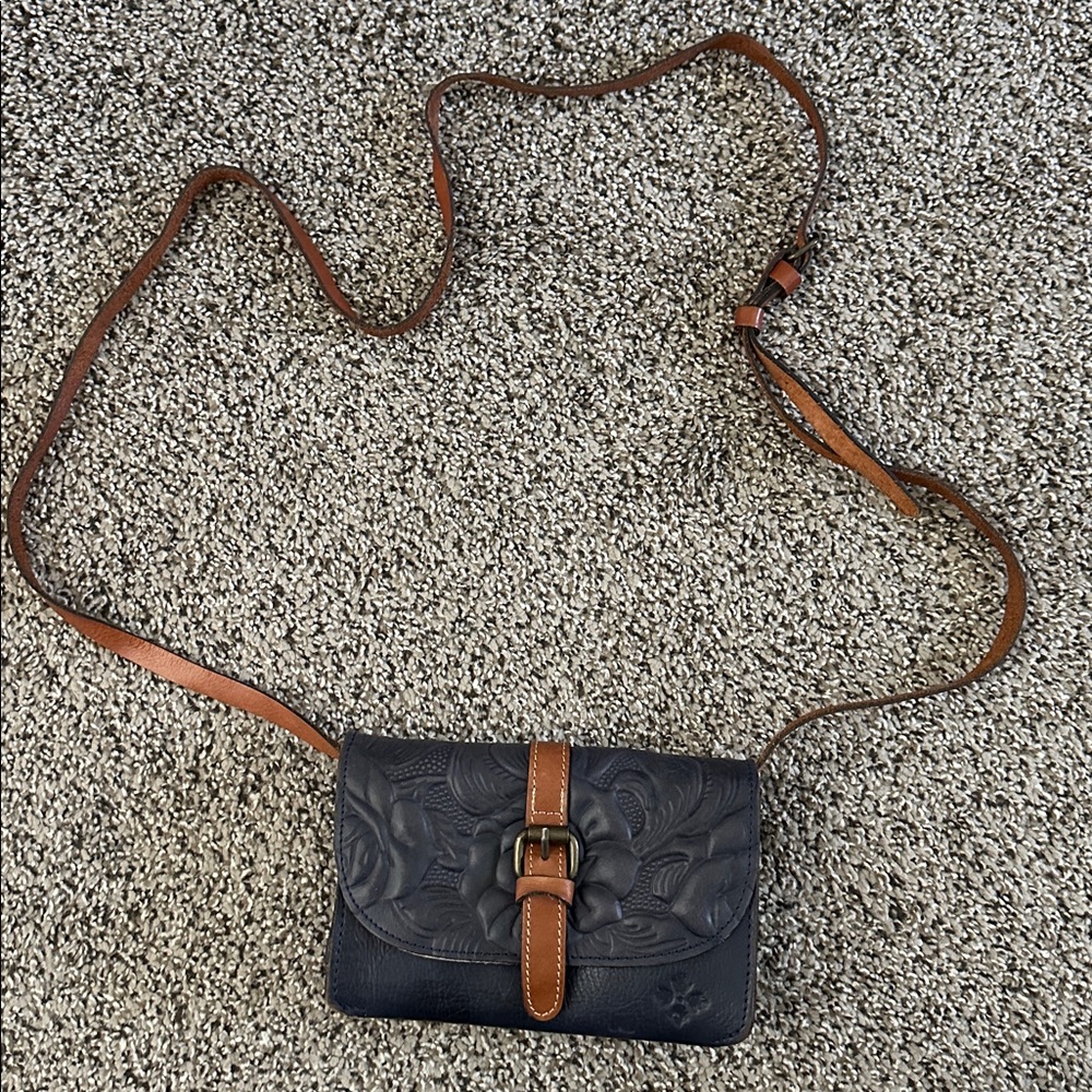 Patricia Nash Torri crossbody bag, navy and tan leather. Excellent condition
